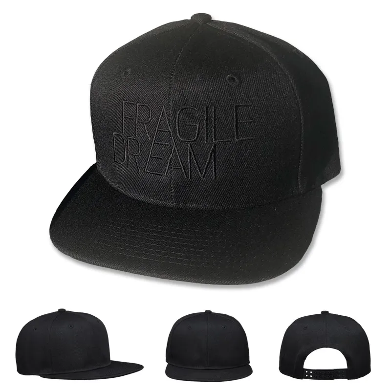 Black snapback cap with the Fragile Dream logo embroidered in black